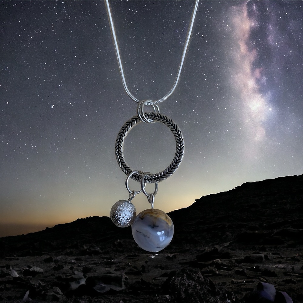 Elegant Silver Plated Necklace with Dual Charms of the Earth and Moon